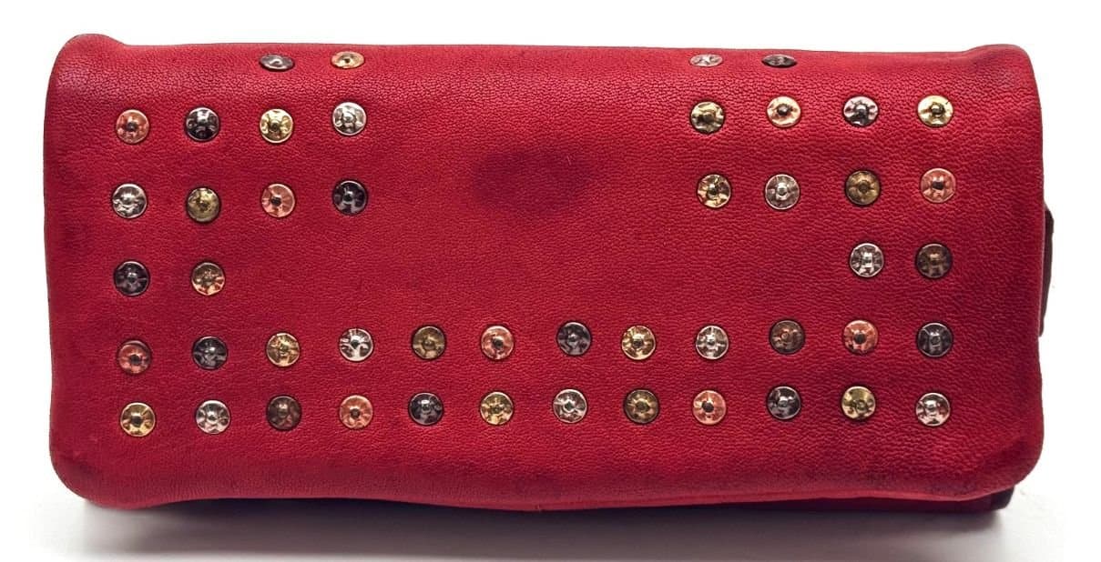 GABICCE: portafoglio in vera pelle tamponata di alta qualità realizzato artigianalmente, colore ROSSO, Chiaroscuro Made in Italy.
